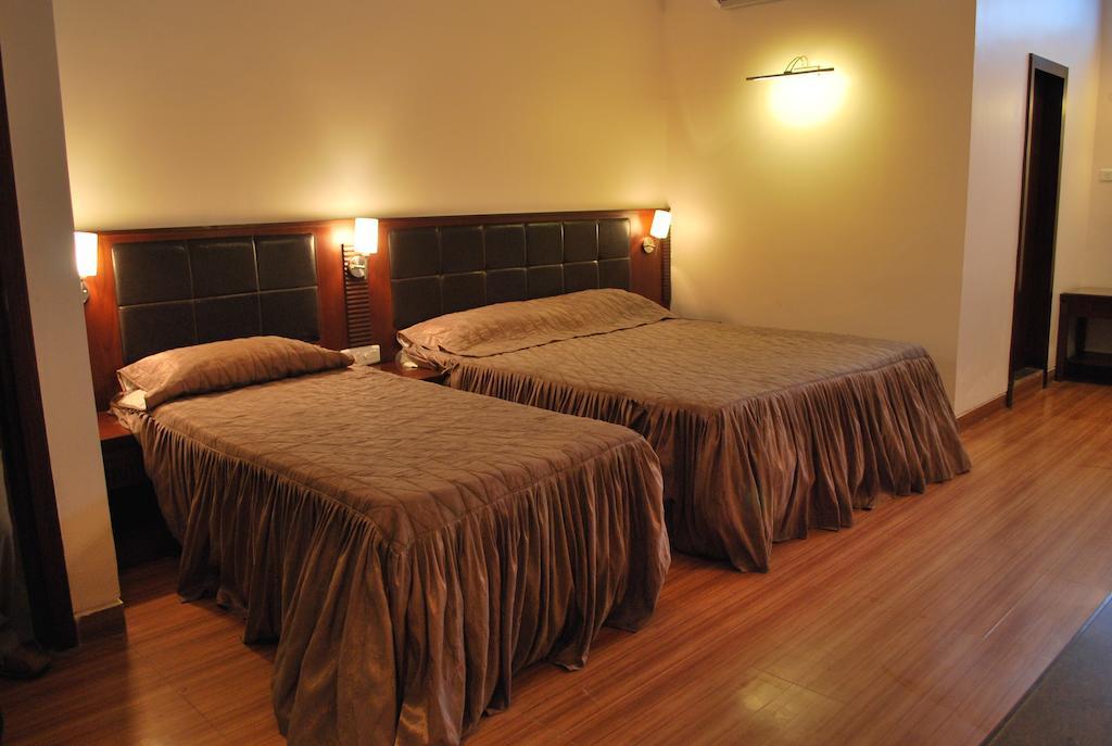 Hotel Millennium Γουβαχάτι Δωμάτιο φωτογραφία